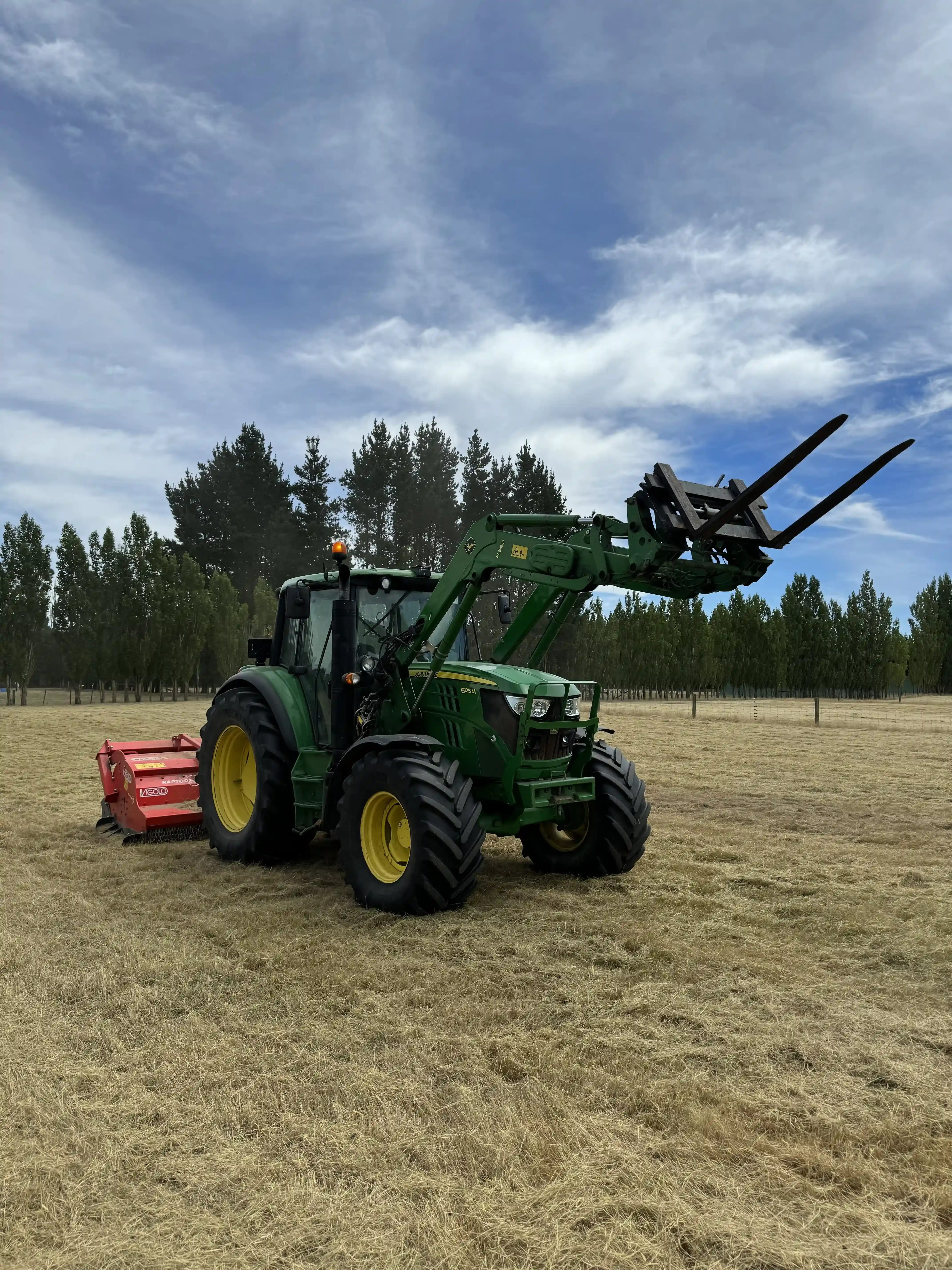 Heavy-duty mulching equipment clearing dense vegetation in Canterbury